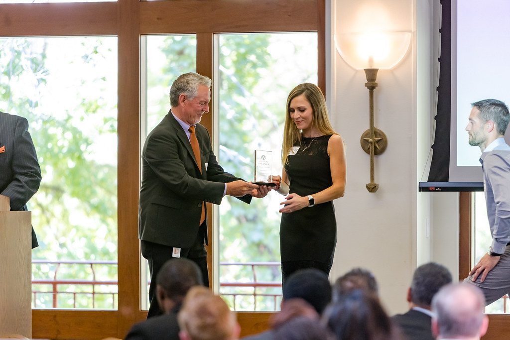 Ellen receiving the 2022 Business Champion Award